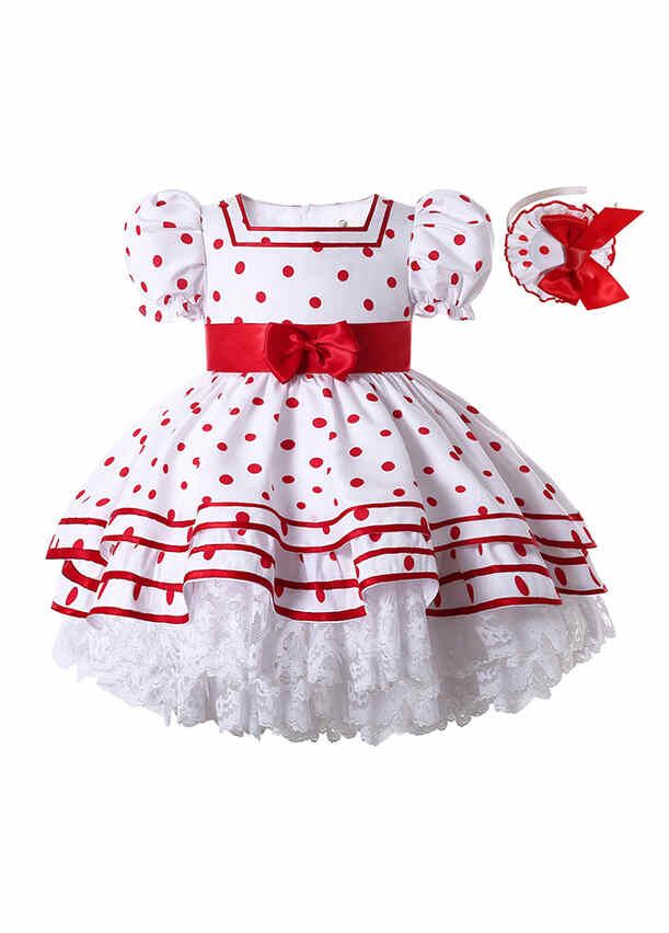 White dress 2025 with red dots